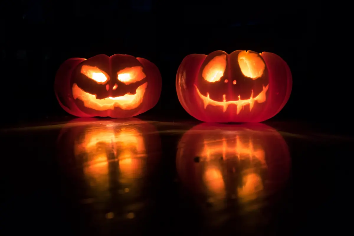 Halloween Pumpkins Lit Up at Night