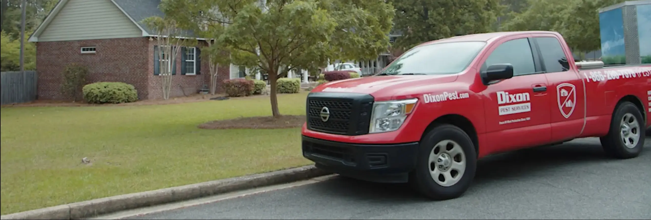 Service truck outside of a home - Dixon Pest Services experts in Baymeadows